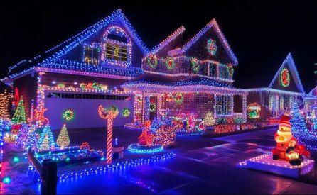 Family rnjoying a peasceful holiday evening in their decorated living room, symbolizing safety and togetherness. 